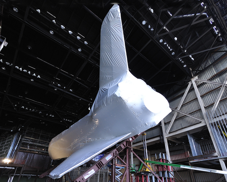 rear rotating into position